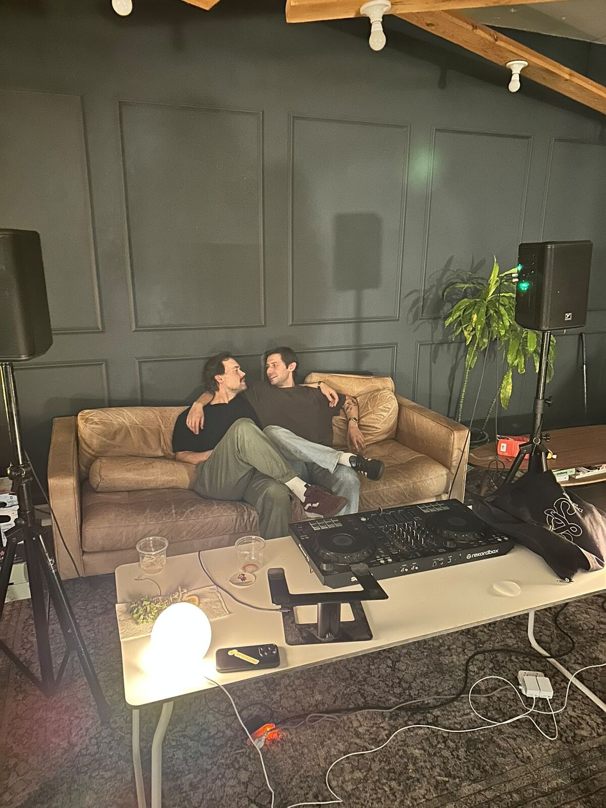 Two guests sitting together on the couch in the lounge